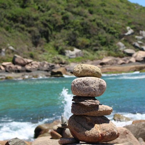 A serene landscape with balanced stones symbolizing harmony.